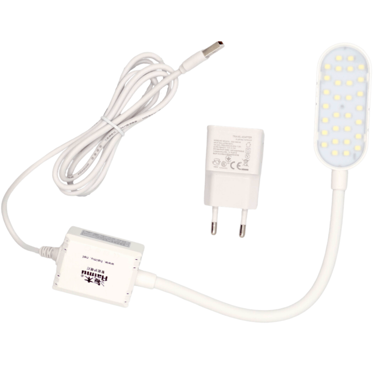 Lampka do maszyn szwalniczych HAIMU HM-12MD z 30 diodami LED, elastycznym przewodem i zasilaczem. Posiada magnes do mocowania. Elementy w kolorze białym, z prostokątną głowicą o zaokrąglonych brzegach. Długość przewodu umożliwia wygodne użytkowanie.
