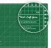 Mata podkładowa TEXI GREEN 60x45 cm w kolorze zielonym, samoregenerująca, z wyraźnymi oznaczeniami i liniami pomocniczymi. Widoczny napis TEXI GREEN 60x45 oraz skala w centymetrach. Ułożona na płasko, na jednolitym tle.