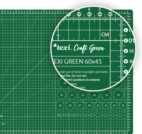 Mata podkładowa TEXI GREEN 60x45 cm w kolorze zielonym, samoregenerująca, z wyraźnymi oznaczeniami i liniami pomocniczymi. Widoczny napis TEXI GREEN 60x45 oraz skala w centymetrach. Ułożona na płasko, na jednolitym tle.