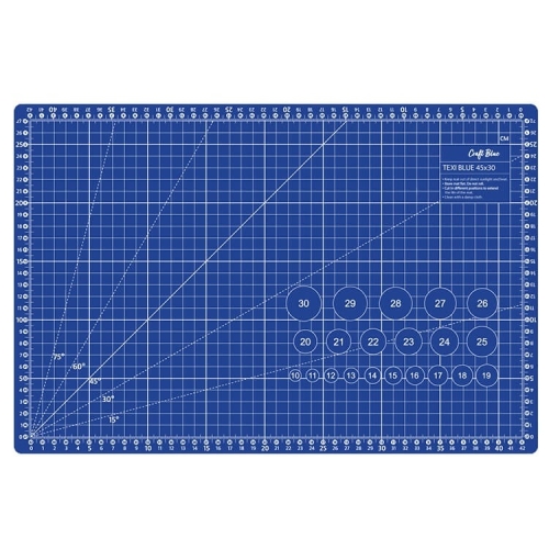 Mata podkładowa TEXI BLUE 45x30 cm, samoregenerująca, w kolorze niebieskim. Na powierzchni widoczne siatki z miarami i kąty, okręgi z numerami oraz logo. Ułożona na płasko, z wyraźnymi oznaczeniami centymetrowymi.