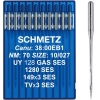 Igły Schmetz UY 128 GAS SES 70 do coverloków w niebieskim opakowaniu. W zestawie widoczne 10 igieł z metalowym trzonkiem, oznaczeniem NM 70 i rozmiarami: 10/027, 1280 SES, 149x3 SES, TVx3 SES. Opakowanie zamknięte, z czytelnym nadrukiem.