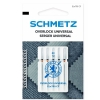 Igły półpłaskie Schmetz ELx705 SUK CF VCS do coverloków, pakowane w przezroczystym opakowaniu. Widoczne oznaczenia 80 i 12, logo Schmetz. Tło w odcieniach niebieskiego, z elementami tkanin.
