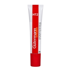 Tubka kleju Gutermann HT2 30 g pokazana na białym tle. Zdjęcie wyraźnie prezentuje smukłe opakowanie, czerwono-białą etykietę, oznaczenie HT2 oraz precyzyjną formę produktu do klejenia tkanin.