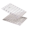 Składana linijka do patchworku i quiltingu Fiskars 1023902 o wymiarach 6x24 cali, wykonana z przezroczystego materiału, z wyraźnymi podziałkami w centymetrach i calach, ukazana w pozycji otwartej, z widocznymi liniami pomocniczymi i kątami.
