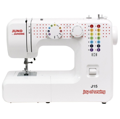Maszyna do szycia Janome JUNO J15 w białej obudowie, z pokrętłami do wyboru ściegów i funkcji. Widoczny napis joy of sewing oraz logo Janome. Stojąca, frontalnie ukazana, z widocznym miejscem na igłę i stopkę.