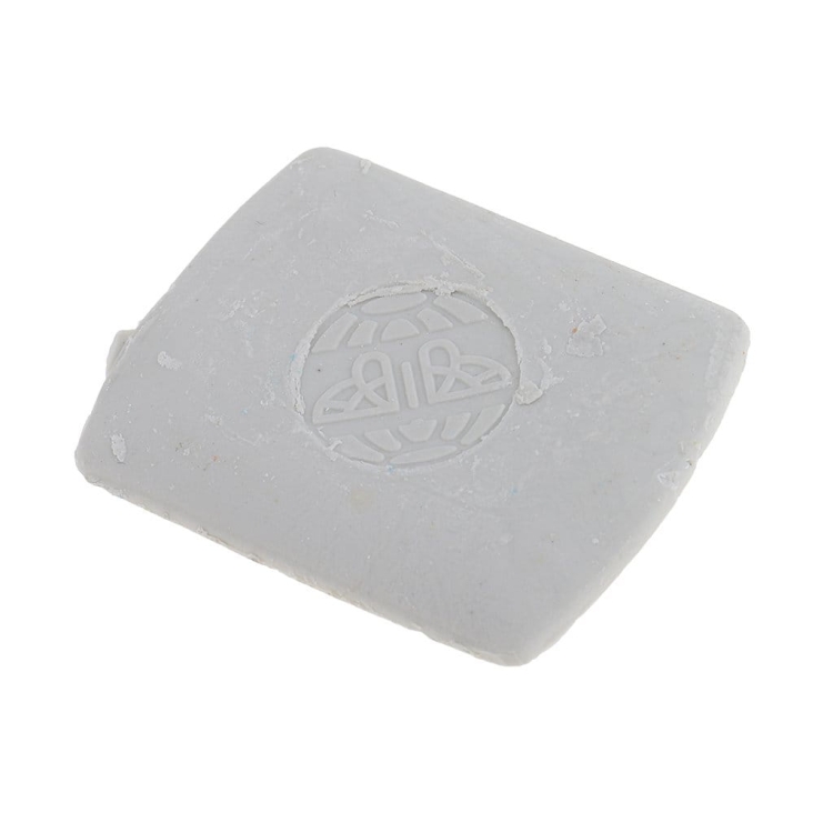 Szara kreda krawiecka woskowa ARGO, prostokątna, z delikatną fakturą. Widoczne logo na powierzchni. Produkt leżący na białym tle, doskonały do oznaczania materiałów w szyciu.