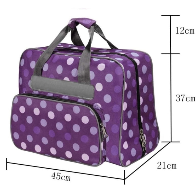 Fioletowa torba w kropki na maszynę do szycia, z wymiarami 45 cm x 21 cm x 37 cm. Posiada szare uchwyty i zamek błyskawiczny oraz zewnętrzną kieszeń. Wzór w kropki w odcieniach fioletu i jasnego różu.