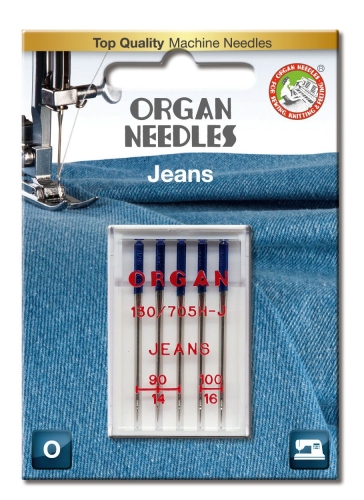 Igły półpłaskie ORGAN 130/705H-J do jeansu w blistrze, zawierające pięć igieł w rozmiarach 90 i 100. Opakowanie na tle niebieskiego materiału dżinsowego z widocznymi napisami ORGAN oraz JEANS.