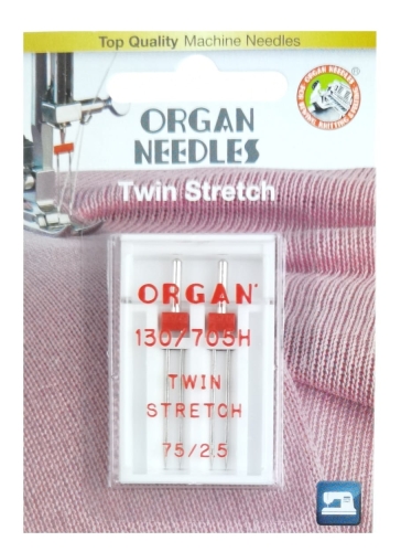 Igła podwójna półpłaska 130/705H Organ TWIN do stretchu, rozmiar 75/2,5 mm, w opakowaniu blistrze z przezroczystym wieczkiem. Widoczne dwa metalowe igły z czerwonymi uchwytami, umieszczone na białym tle z napisem ORGAN i TWIN STRETCH.