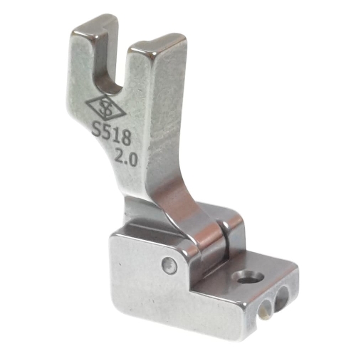 Stopka do wszywania zamków S518 krytych, wykonana z metalu, w kolorze srebrnym. Ma szerokość 14 mm, z wycięciem dla zamka i oznaczeniem S518 2.0. Ujęcie z boku, pokazujące szczegóły konstrukcji oraz mocowanie.