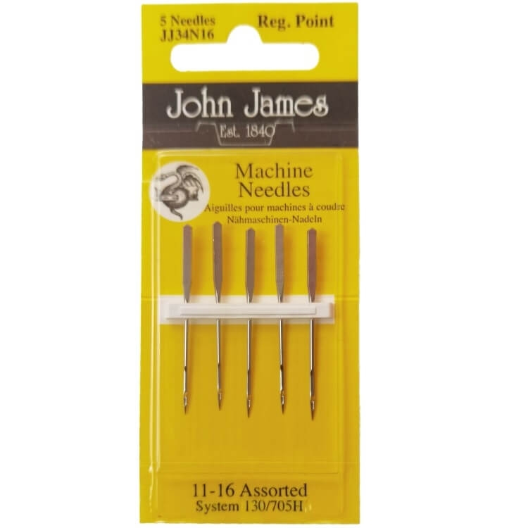 Igły półpłaskie 130/705H uniwersalne mix 80-100, zestaw 5 sztuk. Opakowanie w kolorze żółtym z logo John James. Widoczne igły o metalicznym wykończeniu, z regulowanym punktem, umieszczone na białym tle w opakowaniu.