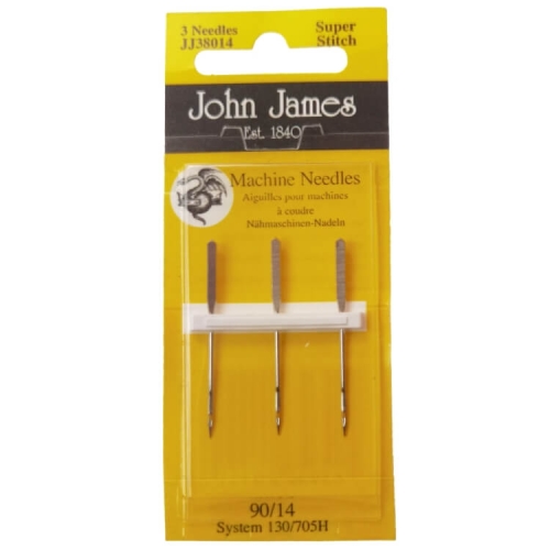 Igły półpłaskie John James 130/705H Super Stitch w opakowaniu, trzy sztuki. Widoczne igły z metalowym trzonkiem i płaskim uchwytem, na żółtym tle z napisem Machine Needles i logo producenta. Rozmiar igieł 90/14.