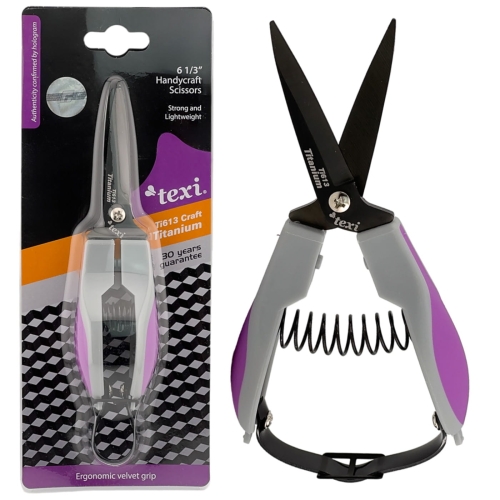 Nożyczki tapicerskie TEXI Titanium Ti613 CRAFT 16cm, z ergonomicznie zaprojektowanym uchwytem w kolorze szaro-fioletowym. Ostrza pokryte tytanem, w opakowaniu. Widoczna sprężyna wspomagająca otwieranie. Idealne do precyzyjnego cięcia materiałów.